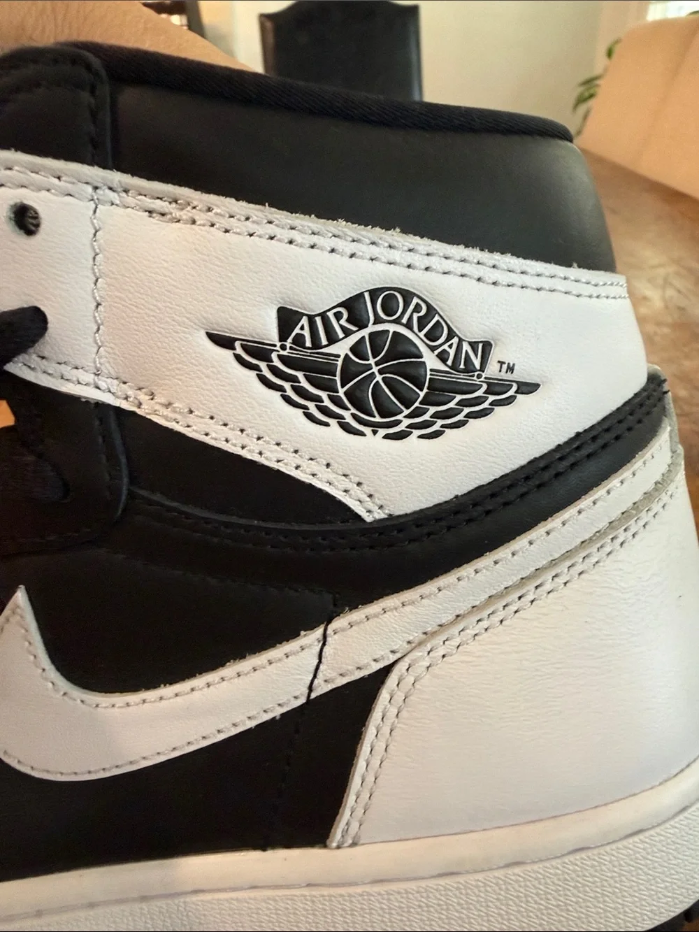 Jordan Black and White Retro High-Top Sneakers